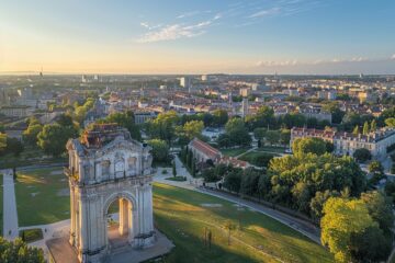 Vue panoramique de la ville de Limoges éclairée au crépuscule, illustrant le marché prometteur de l'investissement immobilier